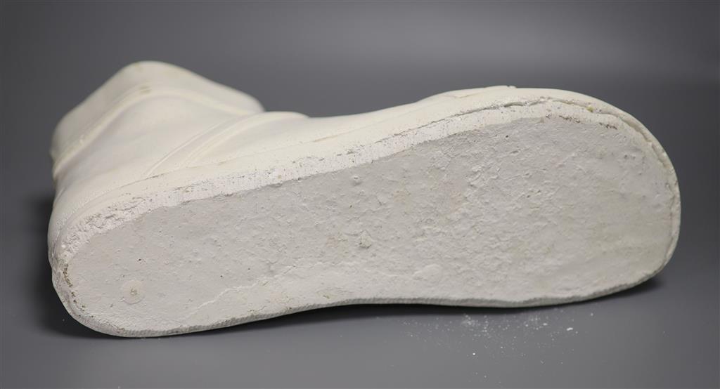 A cast plaster model of a gladiators foot, length 37cm